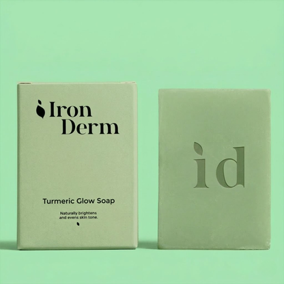 NAIA Turmeric Fade & Glow Bar soap with turmeric and natural ingredients for radiant skin, shown in a close-up image.